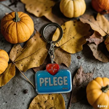 Acryl-Schlüsselanhänger "Pflege" mit Herz