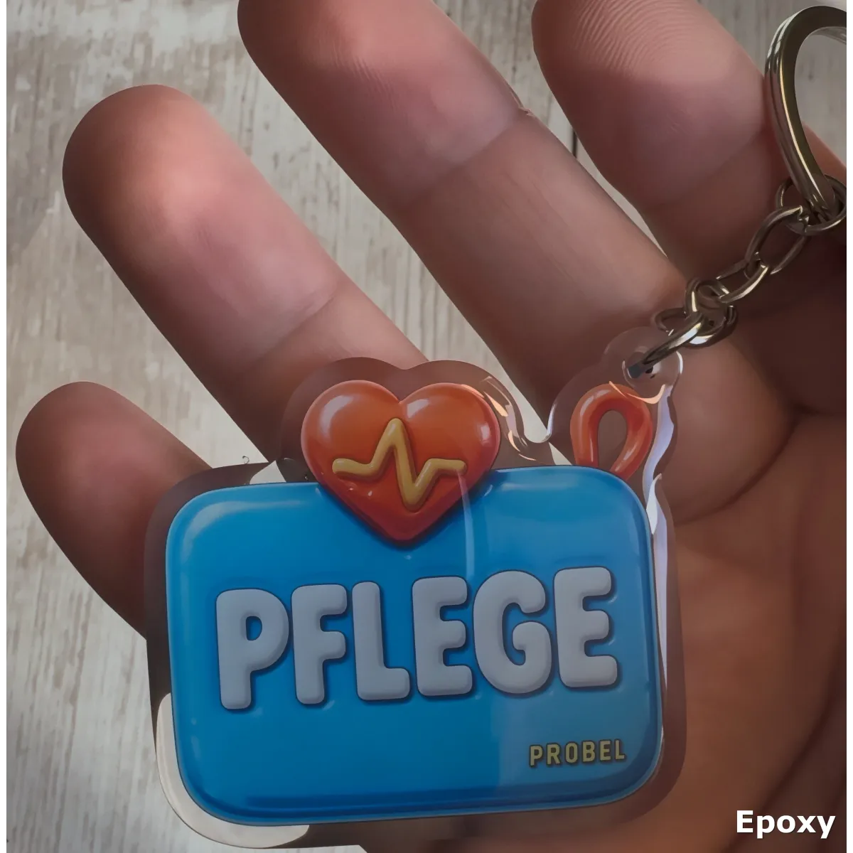 Acryl-Schlüsselanhänger "Pflege" mit Herz