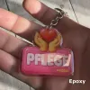 Acryl-Schlüsselanhänger "Pflege" mit Herz und Händen