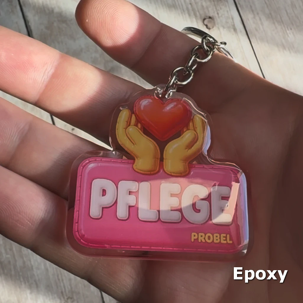 Acryl-Schlüsselanhänger "Pflege" mit Herz und Händen