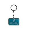 Acryl-Schlüsselanhänger "Pflege" mit Pflaster-Symbol