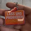 Brelok akrylowy "LASS UNS PROBIEREN" – motyw papryczki chili