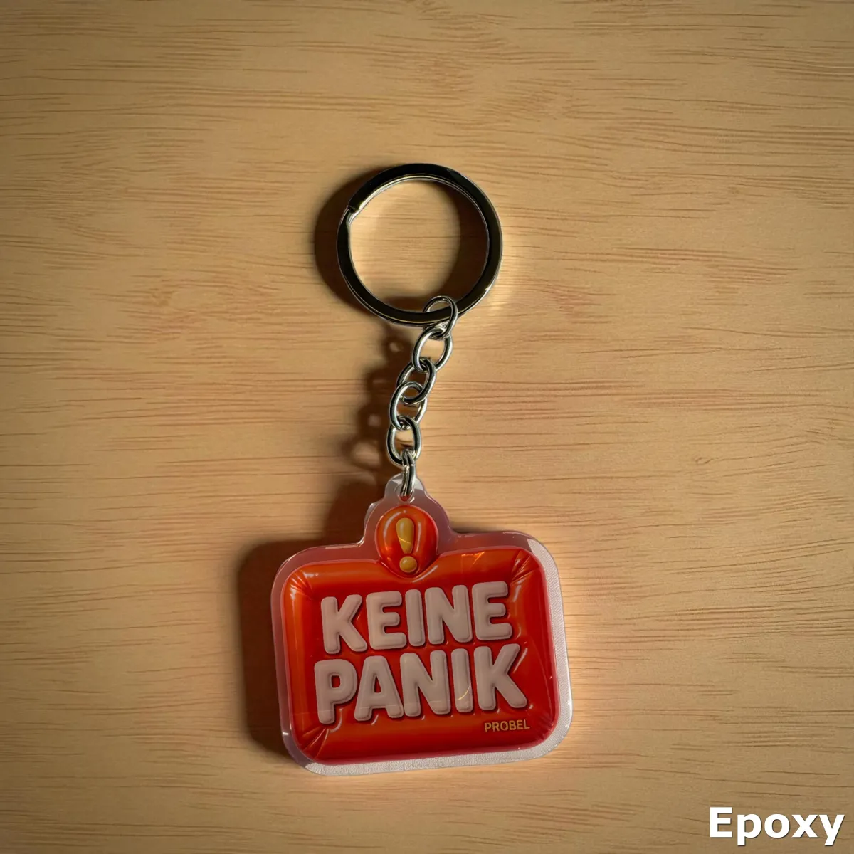 Akrylový přívěsek "KEINE PANIK"