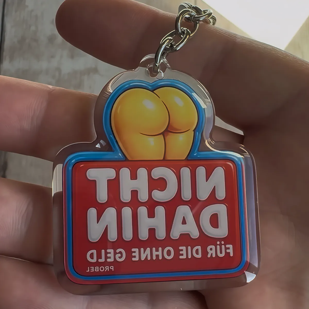 Брелок акриловый "NICHT DAHIN FÜR DIE OHNE GELD" акрил, Bubble Design