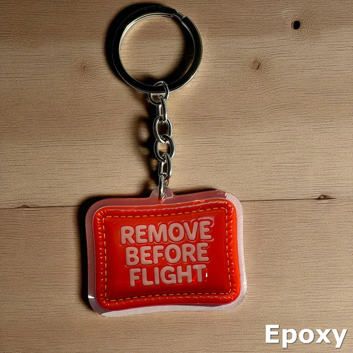 Acryl-Schlüsselanhänger „REMOVE BEFORE FLIGHT“