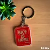 Acryl-Schlüsselanhänger „SKY IS HOME“