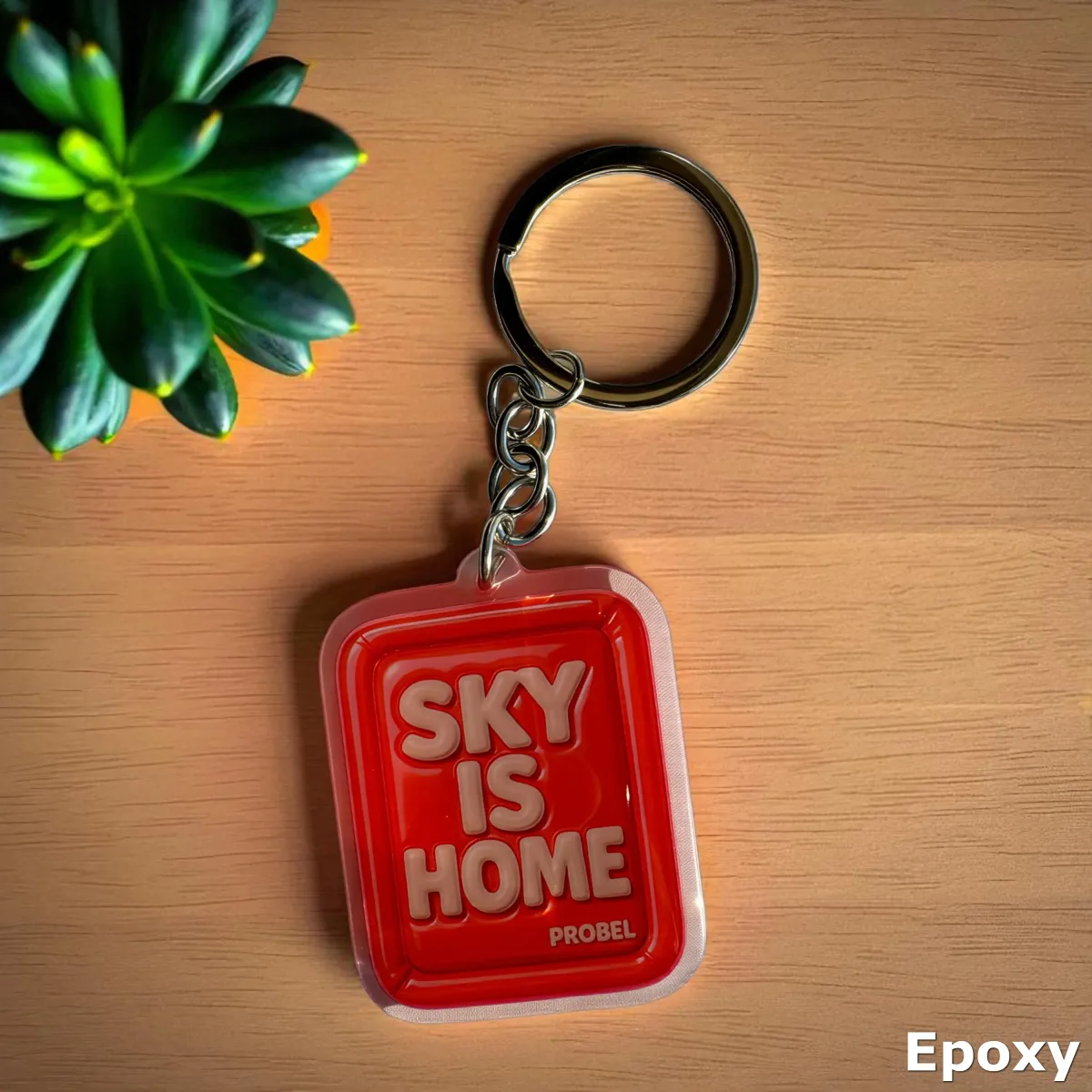 Acryl-Schlüsselanhänger „SKY IS HOME“