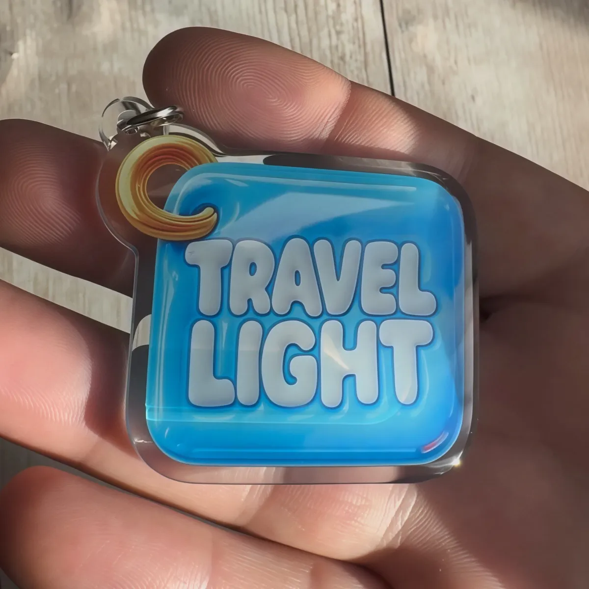 Akryl-Schlüsselanhänger TRAVEL LIGHT (hellblau)