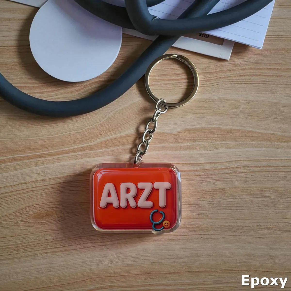 Akrylowy brelok ARZT stetoskopem (czerwony)