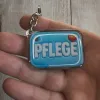 Akryl-Schlüsselanhänger PFLEGE (hellblau)