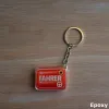 Akrylowy brelok FAHRER (czerwony z kierownicą)