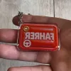 Akrylowy brelok FAHRER (czerwony z kierownicą)