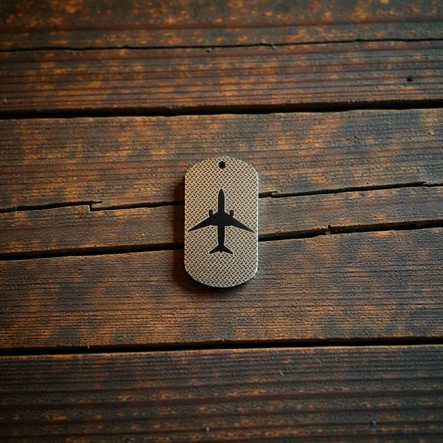 Titan-Schlüsselanhänger – Flugzeug-Silhouetten