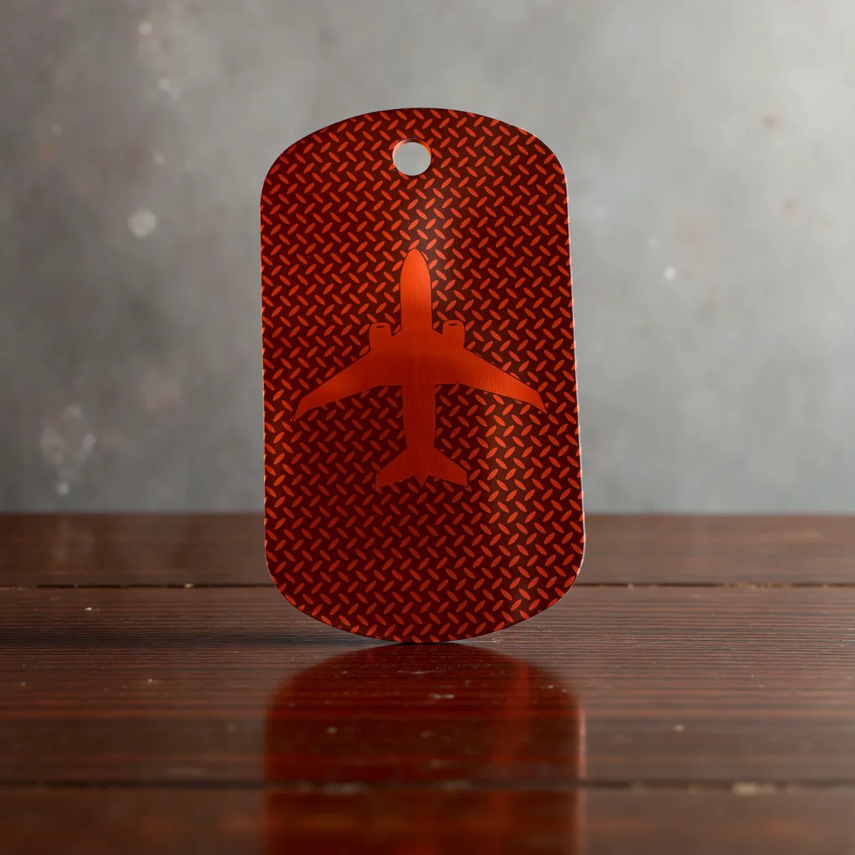 Schlüsselanhänger mit Flugzeugmotiv aus Aluminium
