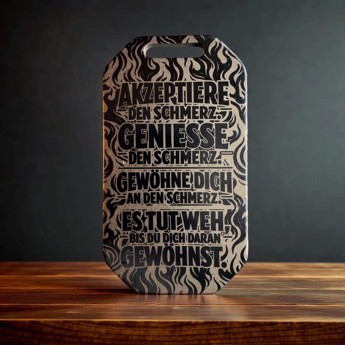 Porte-clés “Akzeptiere den Schmerz” en titane – gravure laser recto-verso