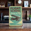 Kovová cedule "Flight School – Learn to Fly"